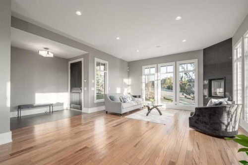 16 Spring Valley Way Sw, Calgary, AB - Indoor Photo Showing Living Room