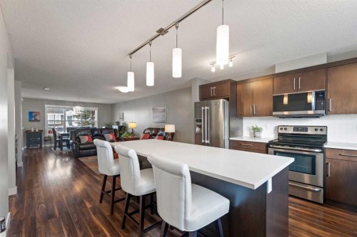 143 Baysprings Terrace, Airdrie, AB - Indoor Photo Showing Kitchen With Upgraded Kitchen