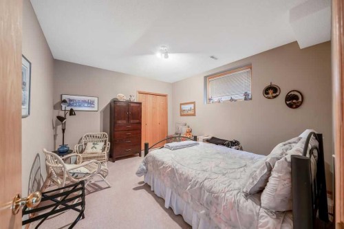 18 Prominence View Sw, Calgary, AB - Indoor Photo Showing Bedroom