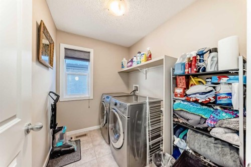 77 Marquis Common Se, Calgary, AB - Indoor Photo Showing Laundry Room