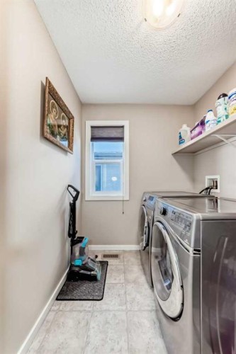 77 Marquis Common Se, Calgary, AB - Indoor Photo Showing Laundry Room