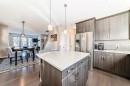 77 Marquis Common Se, Calgary, AB  - Indoor Photo Showing Kitchen With Upgraded Kitchen 