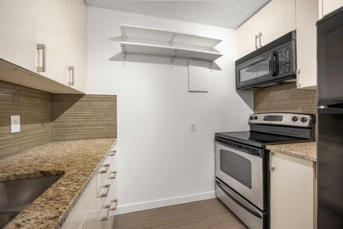 413-4944 Dalton Drive Nw, Calgary, AB - Indoor Photo Showing Kitchen