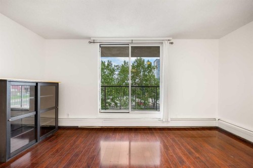 413-4944 Dalton Drive Nw, Calgary, AB - Indoor Photo Showing Other Room