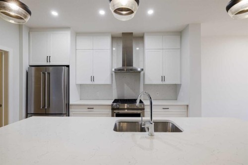 213 Alpine Rush View, Rural Rocky View County, AB - Indoor Photo Showing Kitchen