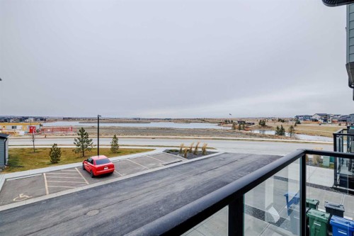 213 Alpine Rush View, Rural Rocky View County, AB - Outdoor With Body Of Water With View