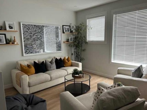213 Alpine Rush View, Rural Rocky View County, AB - Indoor Photo Showing Living Room