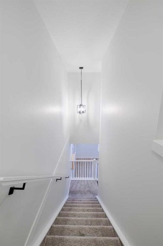 213 Alpine Rush View, Rural Rocky View County, AB - Indoor Photo Showing Other Room