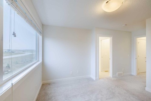 213 Alpine Rush View, Rural Rocky View County, AB - Indoor Photo Showing Other Room