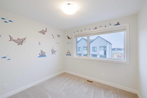 213 Alpine Rush View, Rural Rocky View County, AB - Indoor Photo Showing Other Room