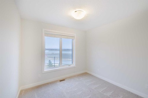 213 Alpine Rush View, Rural Rocky View County, AB - Indoor Photo Showing Other Room