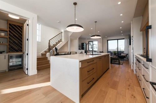 102-1700 73 Street Sw, Calgary, AB - Indoor Photo Showing Kitchen With Upgraded Kitchen