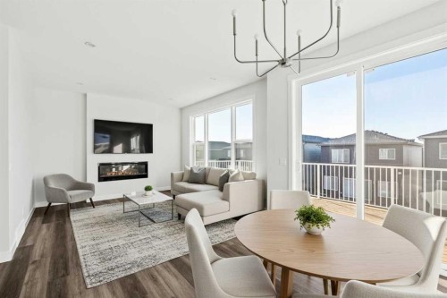54 Lucas Place Nw, Calgary, AB - Indoor Photo Showing Dining Room With Fireplace