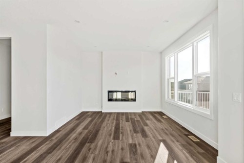 54 Lucas Place Nw, Calgary, AB - Indoor With Fireplace