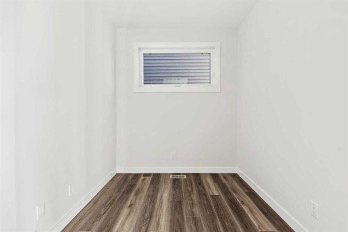 54 Lucas Place Nw, Calgary, AB - Indoor Photo Showing Other Room
