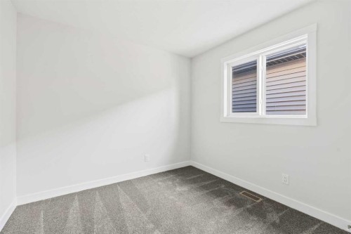 54 Lucas Place Nw, Calgary, AB - Indoor Photo Showing Other Room