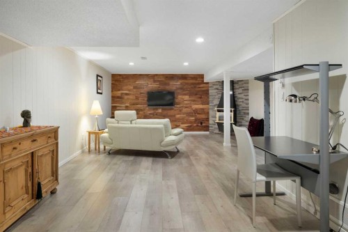 3511 Lakeside Crescent Sw, Calgary, AB - Indoor With Fireplace