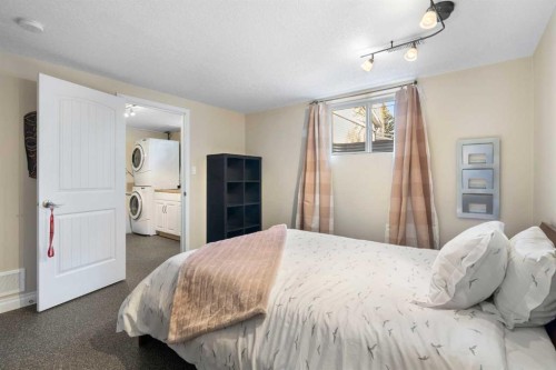 3511 Lakeside Crescent Sw, Calgary, AB - Indoor Photo Showing Bedroom