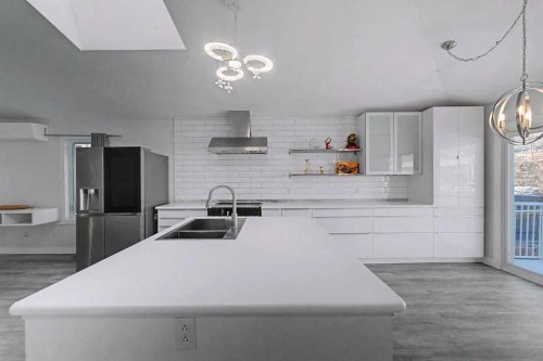 267 Panamount Hill Nw, Calgary, AB - Indoor Photo Showing Kitchen With Double Sink