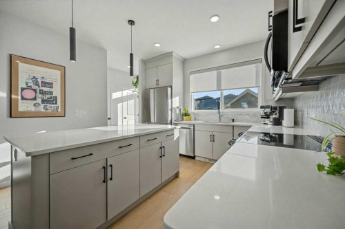 551 Wolf Creek Way Se, Calgary, AB - Indoor Photo Showing Kitchen With Upgraded Kitchen