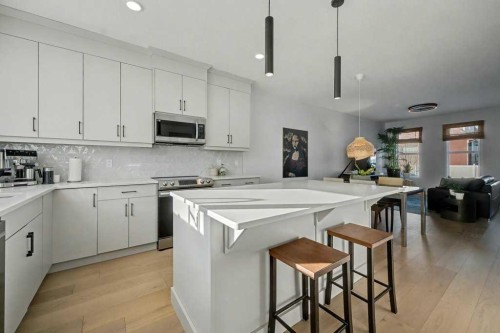 551 Wolf Creek Way Se, Calgary, AB - Indoor Photo Showing Kitchen