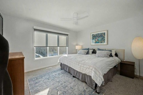551 Wolf Creek Way Se, Calgary, AB - Indoor Photo Showing Bedroom