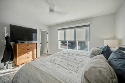 551 Wolf Creek Way Se, Calgary, AB - Indoor Photo Showing Bedroom
