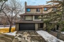 76 Glamis Gardens Sw, Calgary, AB  - Outdoor With Facade 