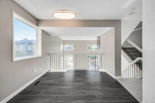 76 Glamis Gardens Sw, Calgary, AB - Indoor Photo Showing Other Room