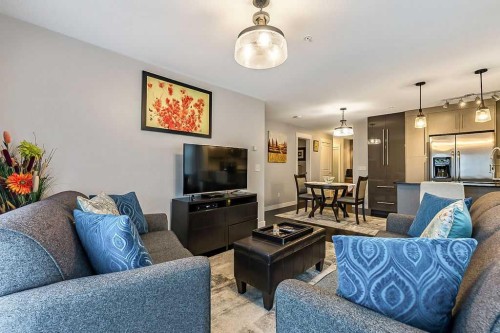 2114-11 Mahogany Row Se, Calgary, AB - Indoor Photo Showing Living Room