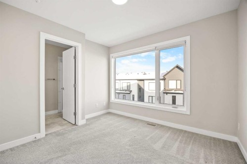 318 Evanscrest Square Nw, Calgary, AB - Indoor Photo Showing Other Room