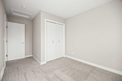 318 Evanscrest Square Nw, Calgary, AB - Indoor Photo Showing Other Room
