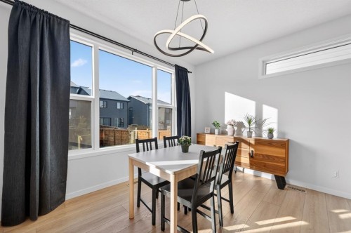 19 Rowley Park Nw, Calgary, AB - Indoor Photo Showing Dining Room