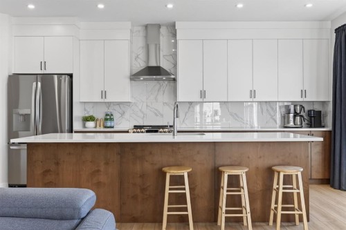 19 Rowley Park Nw, Calgary, AB - Indoor Photo Showing Kitchen With Upgraded Kitchen