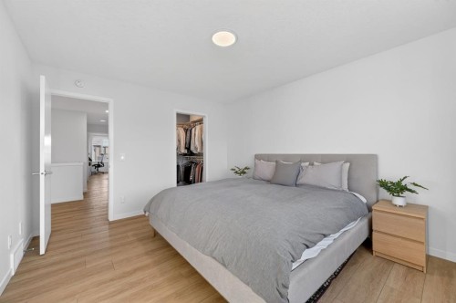 19 Rowley Park Nw, Calgary, AB - Indoor Photo Showing Bedroom