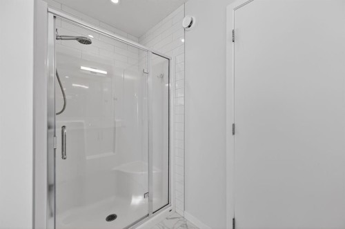 19 Rowley Park Nw, Calgary, AB - Indoor Photo Showing Bathroom