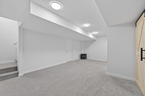 19 Rowley Park Nw, Calgary, AB - Indoor Photo Showing Other Room