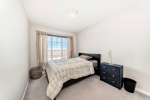 217 Masters Road Se, Calgary, AB - Indoor Photo Showing Bedroom
