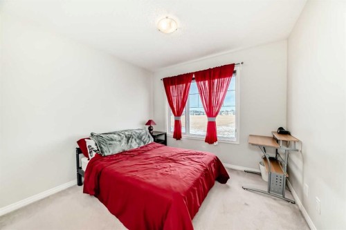 217 Masters Road Se, Calgary, AB - Indoor Photo Showing Bedroom
