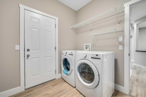 198 Panamount Villas Nw, Calgary, AB - Indoor Photo Showing Laundry Room