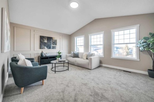 198 Panamount Villas Nw, Calgary, AB - Indoor Photo Showing Living Room