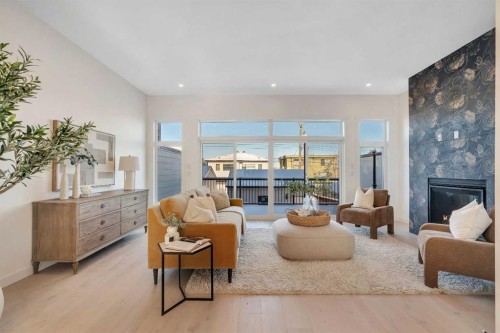 2436 30 Avenue Sw, Calgary, AB - Indoor Photo Showing Living Room With Fireplace
