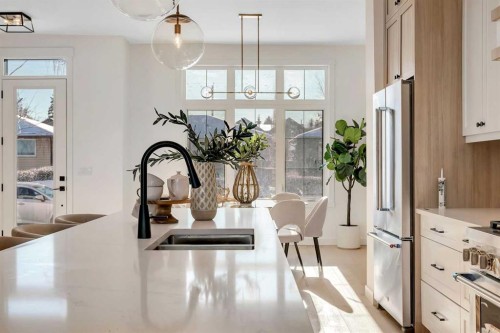 2436 30 Avenue Sw, Calgary, AB - Indoor Photo Showing Kitchen With Stainless Steel Kitchen With Double Sink With Upgraded Kitchen