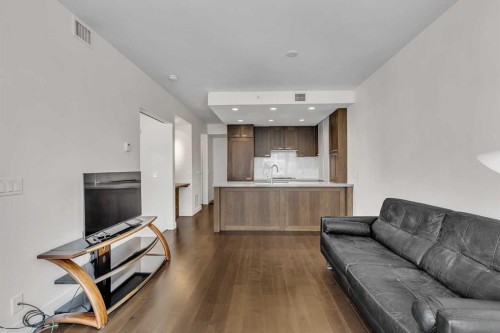 1418-222 Riverfront Avenue Sw, Calgary, AB - Indoor Photo Showing Living Room