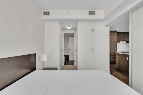 1418-222 Riverfront Avenue Sw, Calgary, AB - Indoor Photo Showing Bedroom