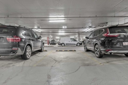 1418-222 Riverfront Avenue Sw, Calgary, AB - Indoor Photo Showing Garage