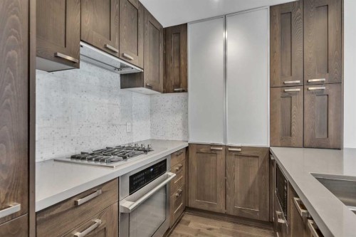1418-222 Riverfront Avenue Sw, Calgary, AB - Indoor Photo Showing Kitchen With Upgraded Kitchen