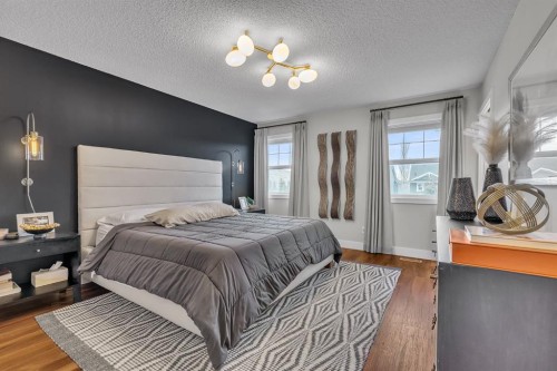 12 Cougar Ridge Manor Sw, Calgary, AB - Indoor Photo Showing Bedroom