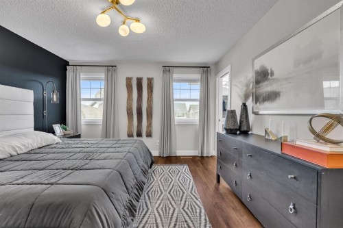 12 Cougar Ridge Manor Sw, Calgary, AB - Indoor Photo Showing Bedroom