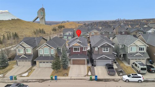 12 Cougar Ridge Manor Sw, Calgary, AB -  With Facade